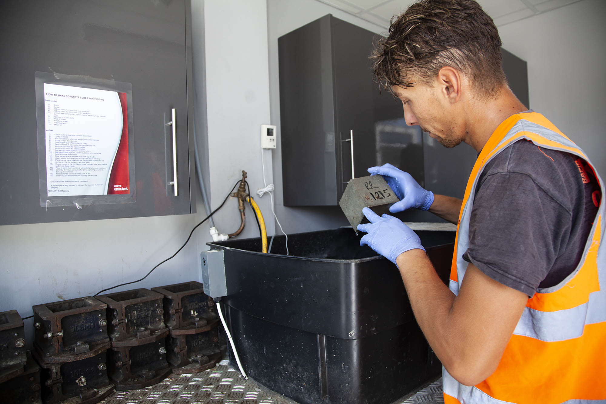 man testing concrete